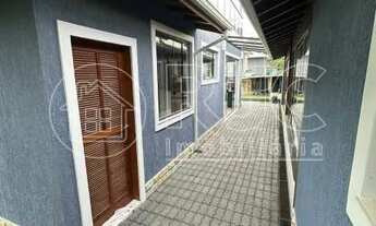 Imagem 4: Casa de condomínio para venda possui 350 metros quadrados com 4 quartos