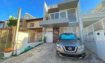 Imagem 2: Casa em Porto Alegre, no bairro Hípica, com 3 dormitório(s), e 3 banheiros, à venda