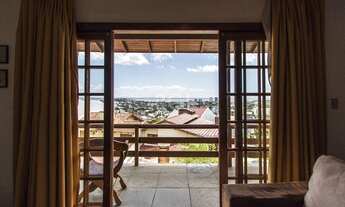 Imagem 2: Casa com vista perene