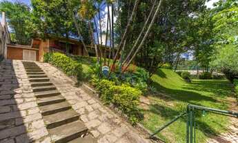 Imagem 2: A Casa das Palmeiras térrea com 3 quartos `a venda no Condomínio Marambaia- Vinhedo S.P