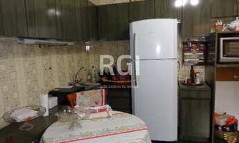 Imagem 7: Ótima casa de 3 dormitórios sendo 1 suíte com closet, lareira e 3 vagas de garagem, no bai