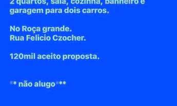 Imagem: Meio terreno com casa