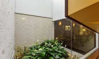 Imagem 2: Casa para venda tem 118 metros quadrados com 3 quartos em Canto do Forte - Praia Grande