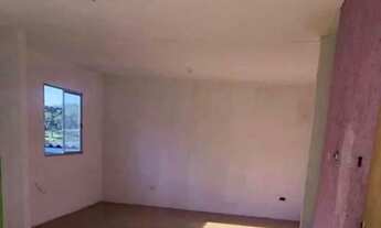 Imagem 2: Meio terreno com casa