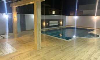 Imagem 7: Casa de Alto Padrão no Condomínio Jardim dos Lagos com 4 Suítes e Piscina Próxima ao Cent