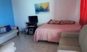 Imagem 2: Casa com 2 quartos, área com churrasqueira e garagem