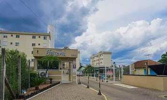 Imagem 3: EMICREI VENDE E ALUGA apartamento dois dormitórios, térreo com pátio e uma vaga de garagem