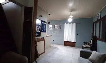 Imagem 7: Casa 2 pavimentos (estilo sobrado), com 2 dormitórios e 2 vagas, no bairro Partenon, em Po