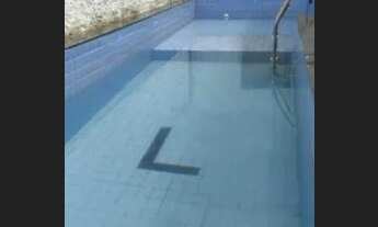 Imagem: Casa com 6/4 e piscina