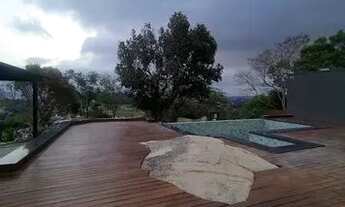 Imagem 2: Casa de condomínio para venda tem 311 metros quadrados com 3 quartos e piscina borda infin