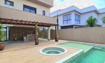 Imagem 2: Casa de condomínio para venda possui 310 metros quadrados com 4 quartos