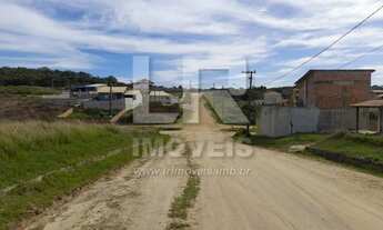 Imagem 2: Terreno de esquina, com 567,77 m², em área urbanizada, próximo à escola *SM-03TR