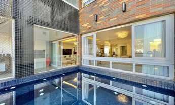 Imagem 1: Piscina privativa com vista para o mar, mobiliado e decorado 4 suítes estuda imóvel de men