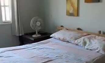 Imagem 3: Casa com 2 quartos, área com churrasqueira e garagem