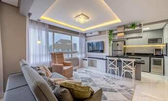 Imagem 2: Imóvel para venda possui 76 metros quadrados com 3 quartos em Menino Deus - Porto Alegre