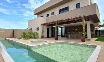 Imagem 3: Casa de condomínio para venda possui 310 metros quadrados com 4 quartos