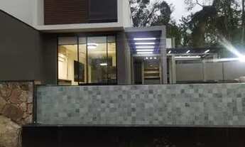 Imagem 5: Casa de condomínio para venda tem 311 metros quadrados com 3 quartos e piscina borda infin