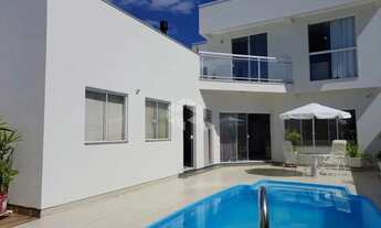 Imagem: CASA COM 4 DORMITÓRIOS NO BAIRRO CARIANOS