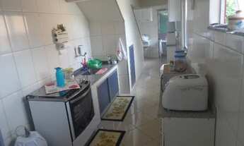 Imagem 6: 2 casas e uma kitnet com garagens