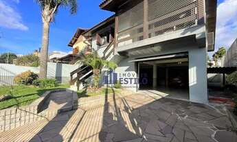 Imagem 2: Casa com 3 dormitórios à venda, 260 m² por R$ 890.000,00 - Santa Lúcia - Caxias do Sul/RS