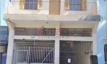 Imagem: Casa assobradada com varanda e vaga na V