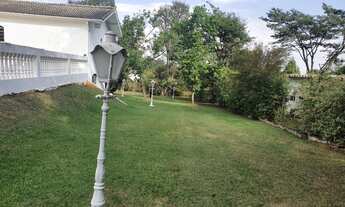 Imagem 4: Chácara para aluguel e venda possui 520 metros quadrados com 5 quartos