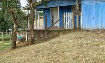 Imagem: Terreno com casa de madeira, ótima localização