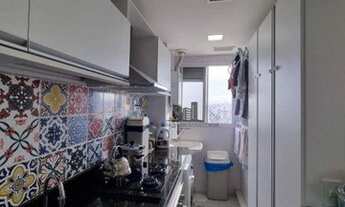 Imagem 2: Apartamento de 02 dormitórios com living estendido e 02 boxes de garagem cobertos no bairr