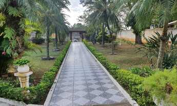 Imagem 6: Chácara para aluguel e venda possui 520 metros quadrados com 5 quartos