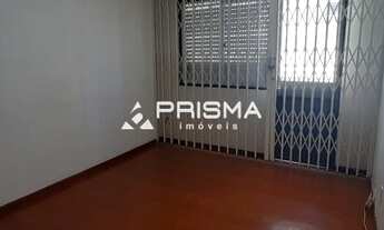 Imagem 2: 2 dormitórios com dependência e sacada no centro