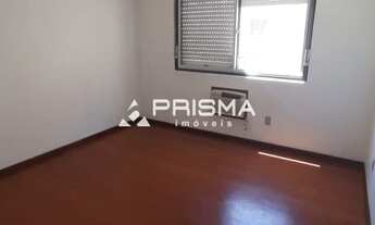 Imagem 7: 2 dormitórios com dependência e sacada no centro