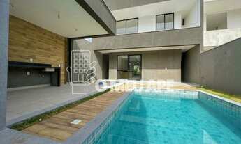 Imagem 6: Casa de condomínio para venda tem 350 metros quadrados com 4 quartos