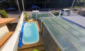 Imagem 7: Sobrado com piscina e móveis planejados