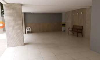 Imagem 3: Apartamento com vista para o mar em prédio moderno