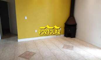 Imagem 7: Casa, em piso superior (segundo pavimento), com dois dormitórios, sala com lareira, sacada