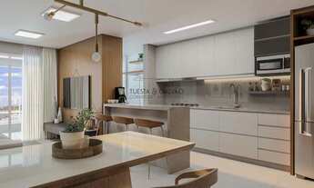 Imagem 3: Apartamento à venda em Curitiba, com uma suíte e um quarto simples, sala de estar/jantar