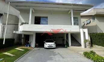 Imagem 2: Casa de condomínio para venda tem 390 metros quadrados com 3 quartos