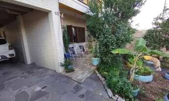 Imagem 3: Casa em Porto Alegre, no bairro Hípica, com 3 dormitório(s), e 3 banheiros, à venda