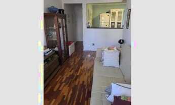 Imagem 2: Apartamento iluminado e bem distribuído com 2 quartos, localizado em prédio sólido e com ó