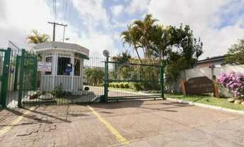 Imagem: Casa em condomínio no bairro Guarujá com