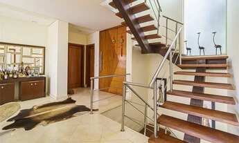 Imagem 2: Descubra a casa dos seus sonhos neste oásis de conforto e luxo, localizado no perímetro do