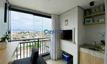 Imagem 6: Apartamento mobiliado em Barreiros com 02 dormitórios, 01 suíte e 02 sacadas e 01 vaga