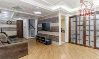 Imagem 2: Sobrado com 4 dormitórios para alugar, 110 m² por R$ 5.905,72/mês - Novo Mundo - Curitiba