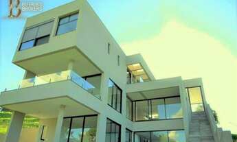 Imagem 2: Linda casa nova com 04 suítes e vista para a mata no Alphaville Gênesis ll