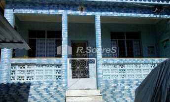 Imagem: Casa linear com três quartos sendo 1 suíte