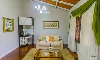 Imagem 7: Casa com 4 dormitórios, 2 suítes, lavabo, jardim, piscina e 3 vagas de garagem à venda