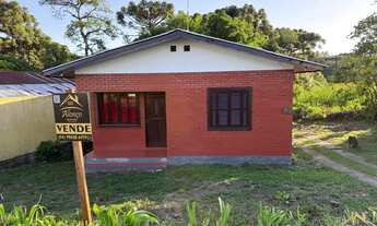 Imagem: Casa à venda com três dormitórios, bairro