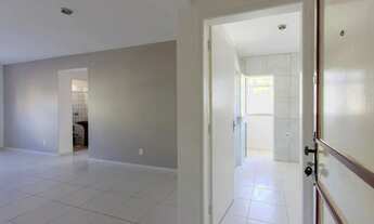 Imagem 2: Apartamento de 02 dormitórios, banheiro social e lavabo. Vista panorâmica, cozinha ampla e