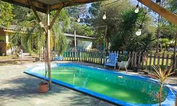 Imagem 4: Velleda oferece belo sítio com casa aconchegante e amplo terreno, refúgio em Águas Claras