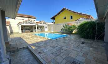 Imagem 2: Casa Fantástica com piscina, churrasqueira e toda projetada no Jardim Matilde, em Praia Gr